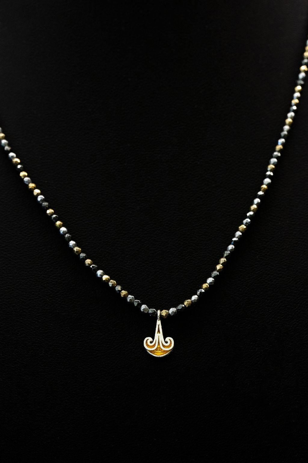 Ikria Amber Charm